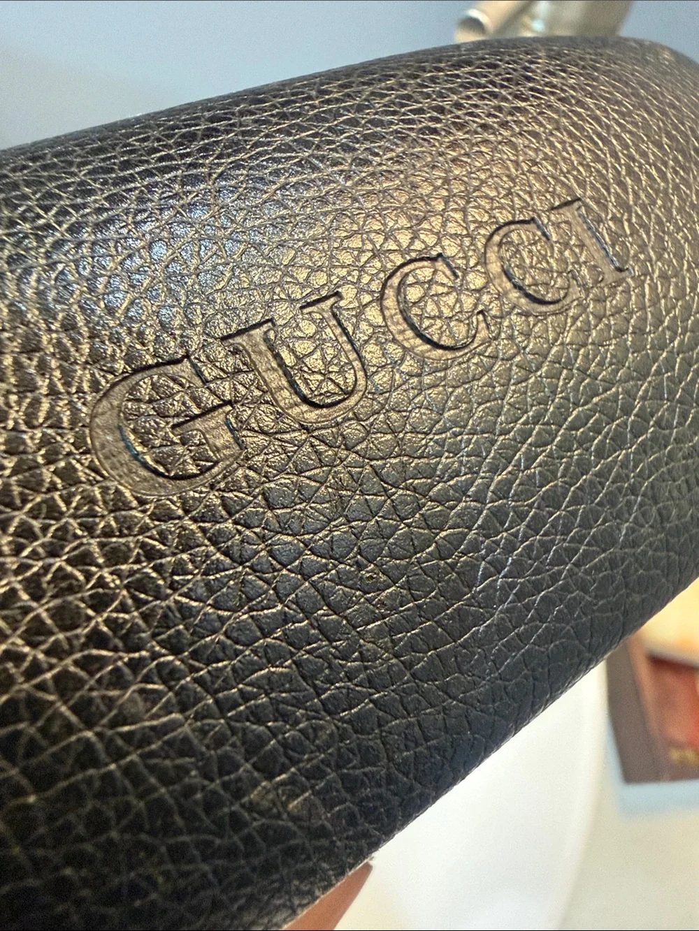 Gucci Men's Black Oval Sunglasses with Silver Accents
